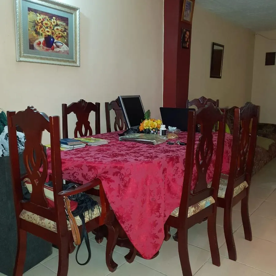 Quarto em Acomodações Particulares Bayfarm Villas Kingston